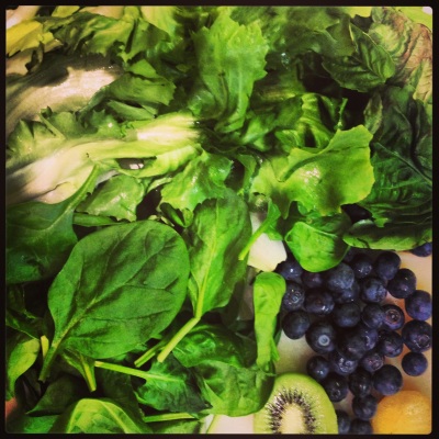 Escarole, spinach, basil, kiwi, blueberries, and ginger